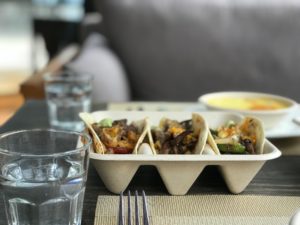 Harvest Fiber taco container on restaurant table