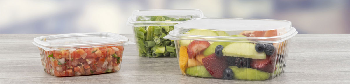 clear food containers with food inside, closed lids